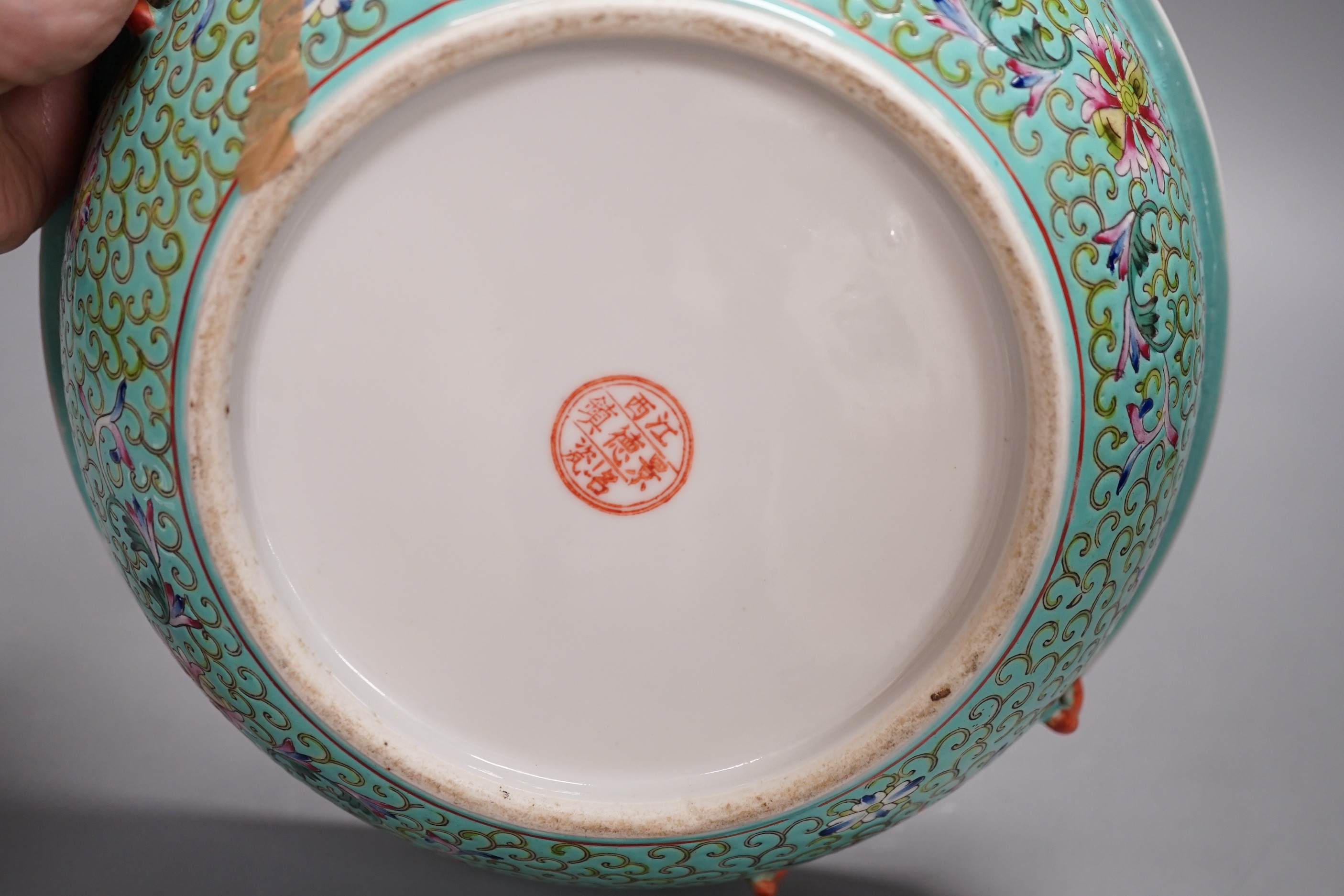 A 20th century Chinese famille rose turquoise ground floral bowl. 23.5cm diameter, lacking cover